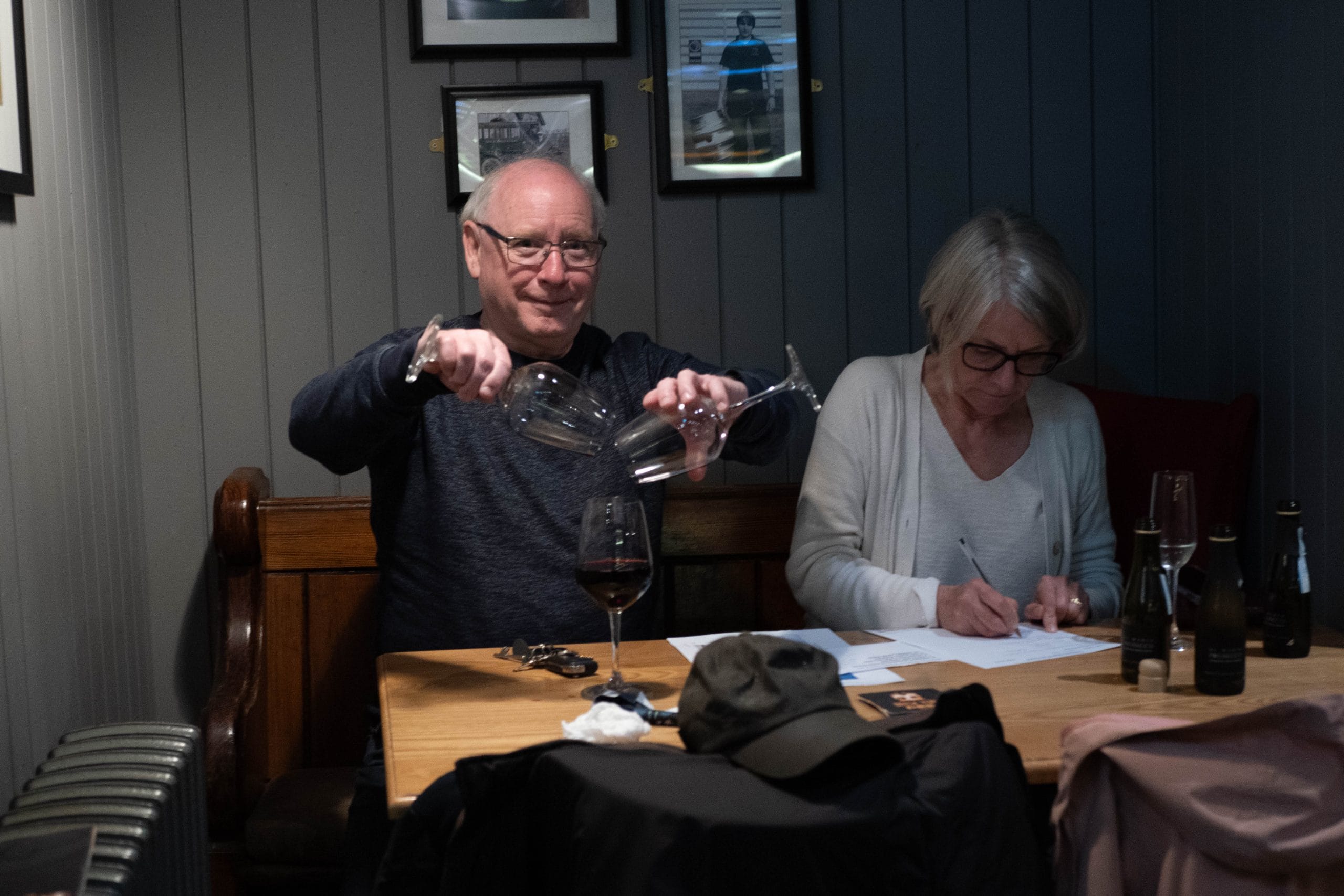 John reading a question off his phone